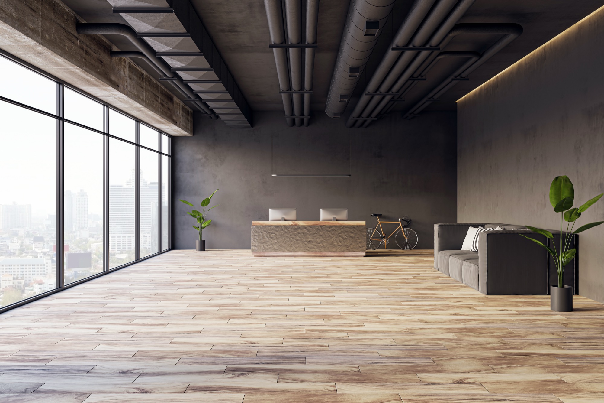 Loft office with herringbone wood floor and city view