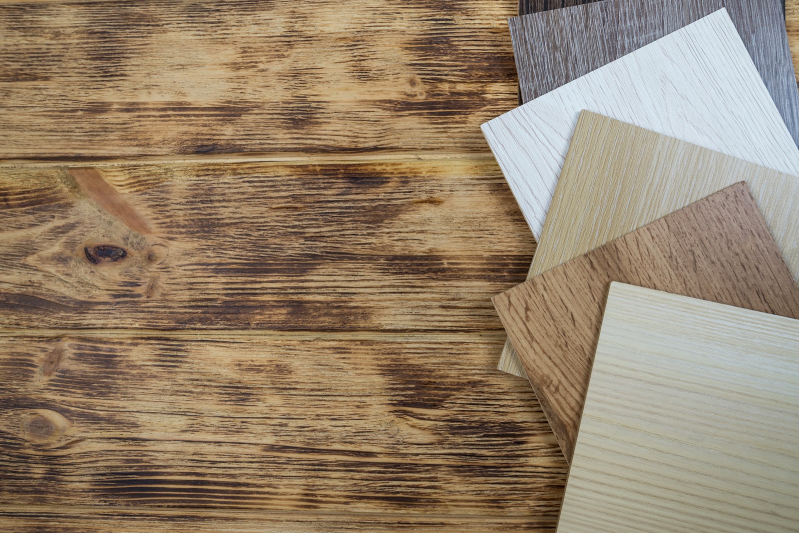Assorted parquet wood samples in different tones and patterns