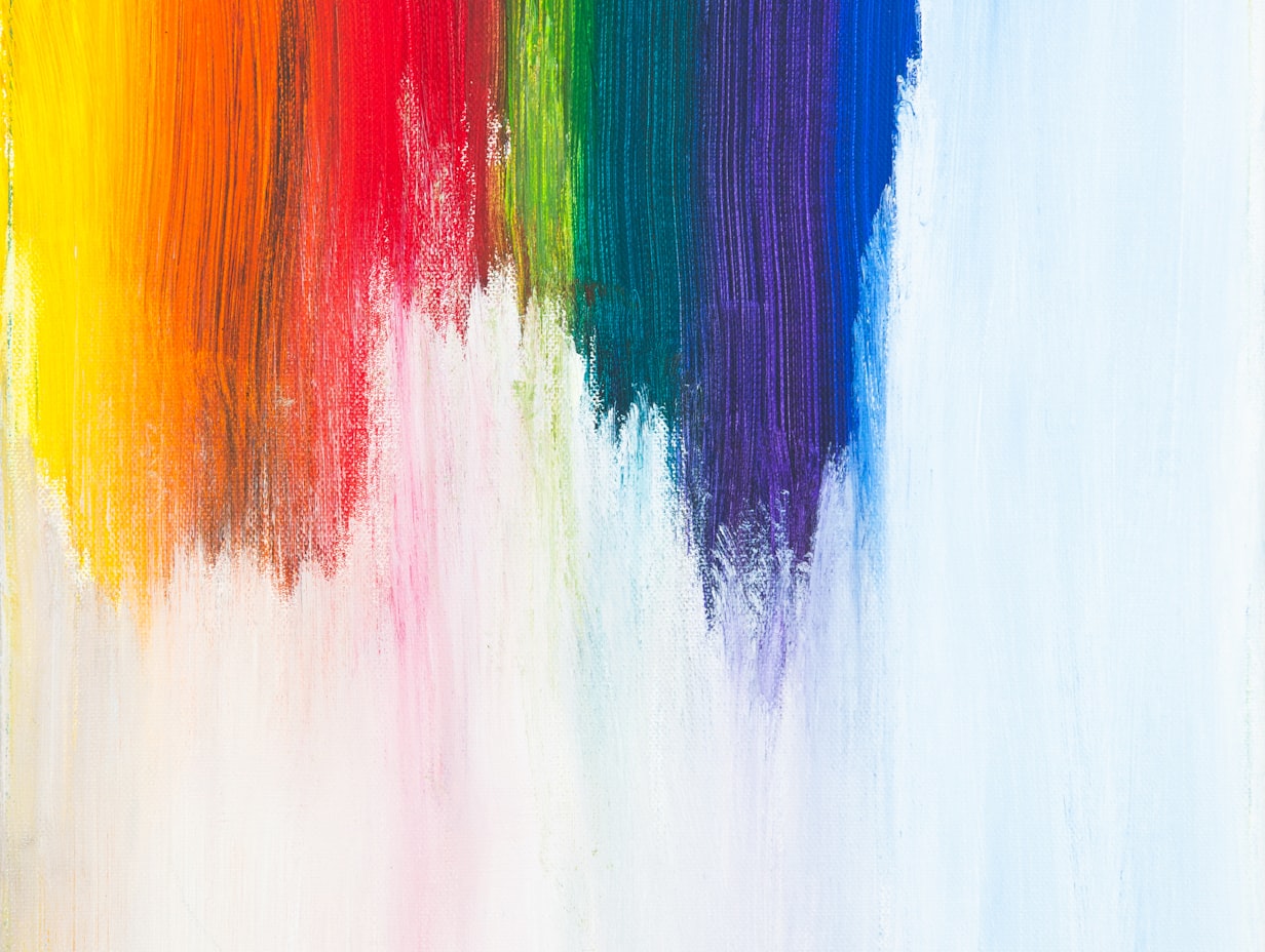 Rainbow brush strokes on canvas