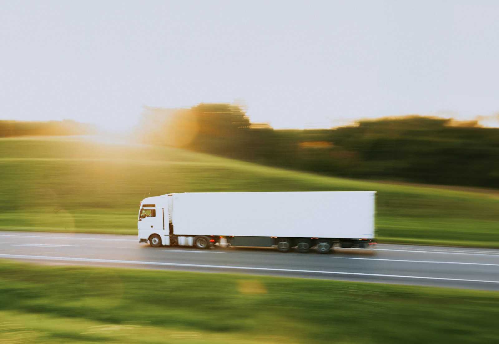 Truck in motion at golden hour
