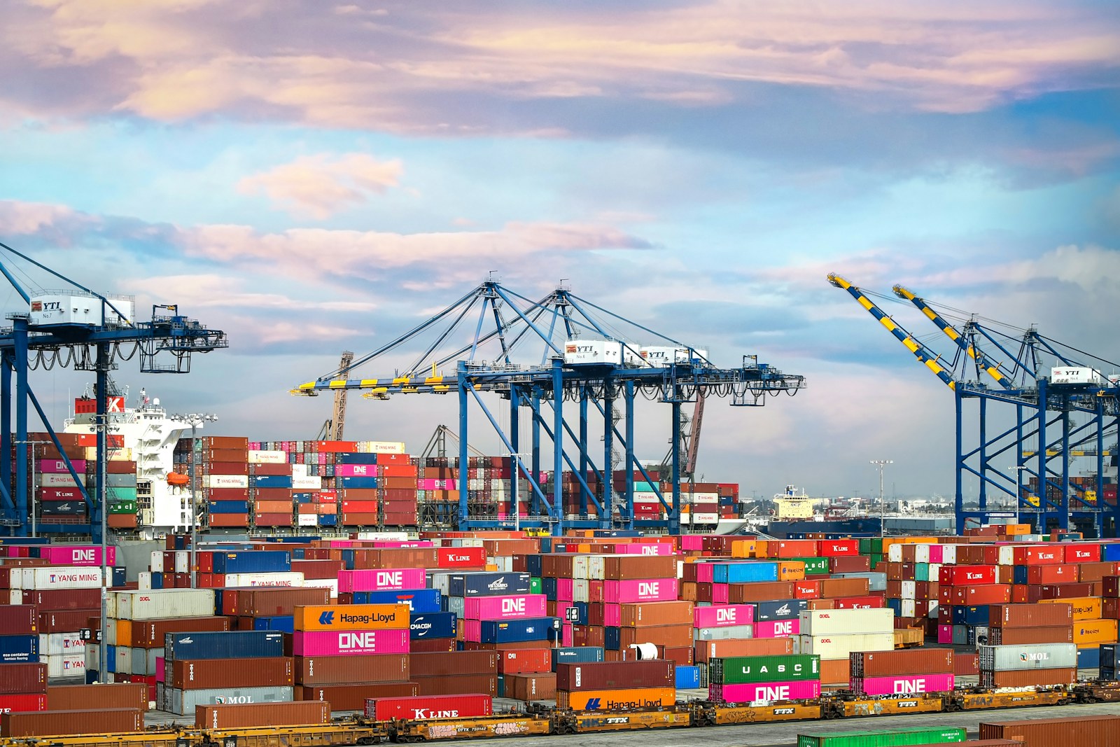 Container port cranes at dusk