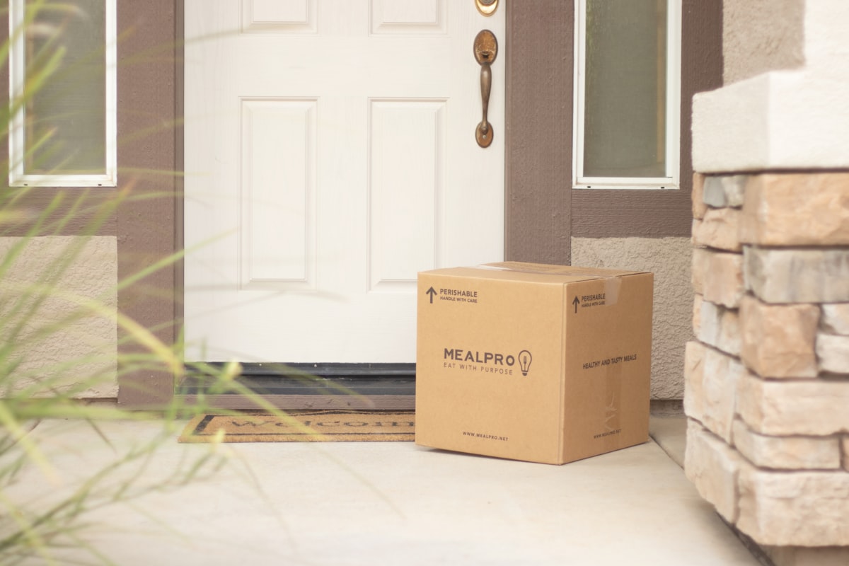 A delivered package placed at a front door