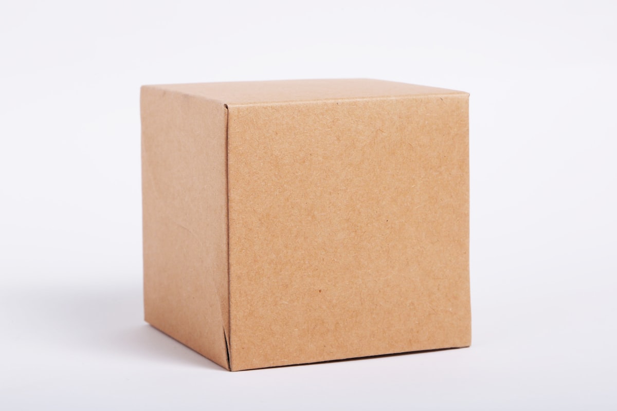 A sealed cardboard box in a studio