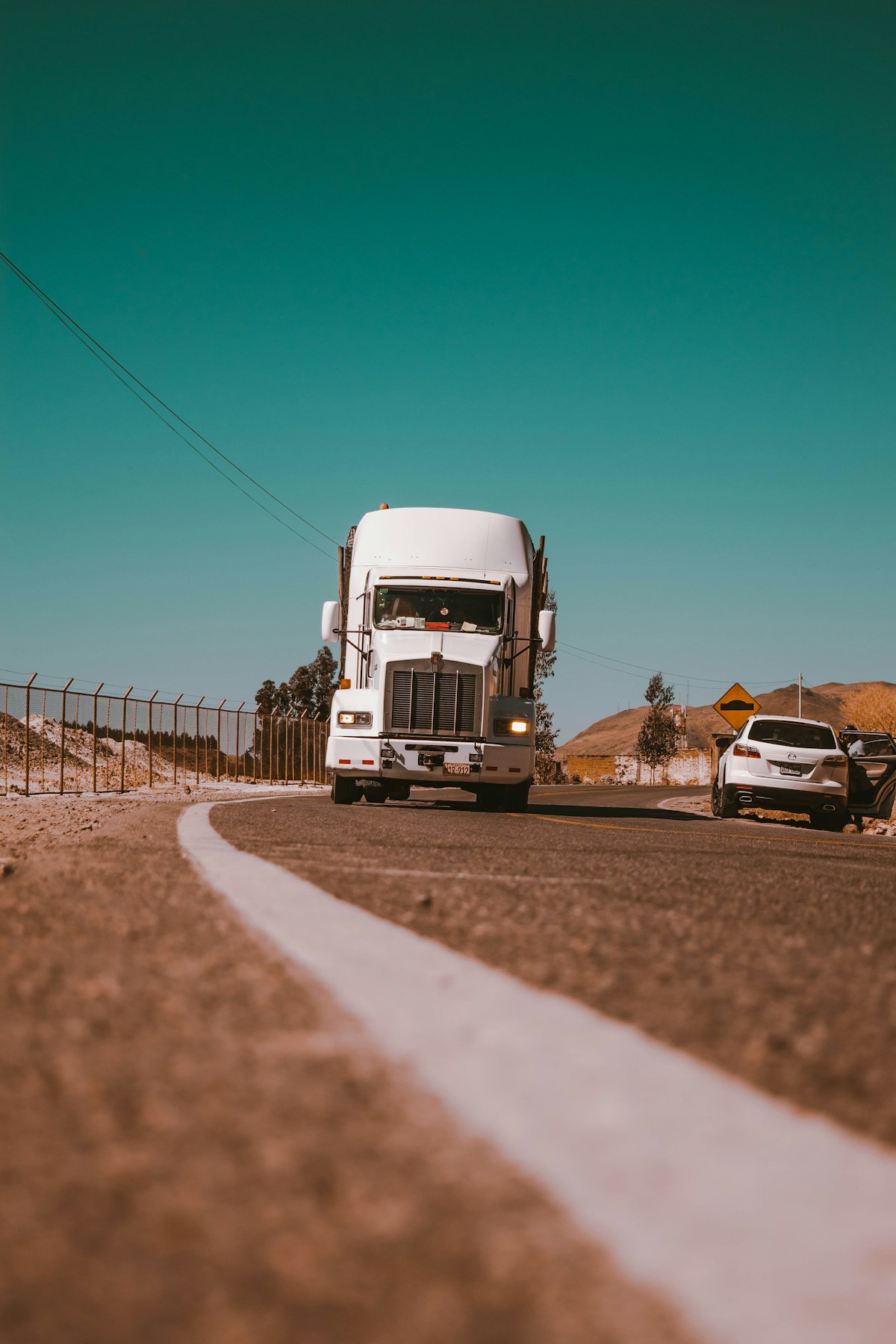 Truck convoy on a desert road
