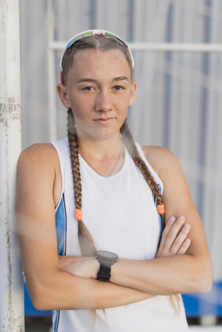 Swim and athletics coach smiling outdoors