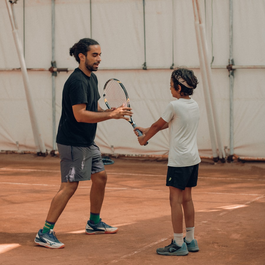Coach guiding a kid through a tennis drill