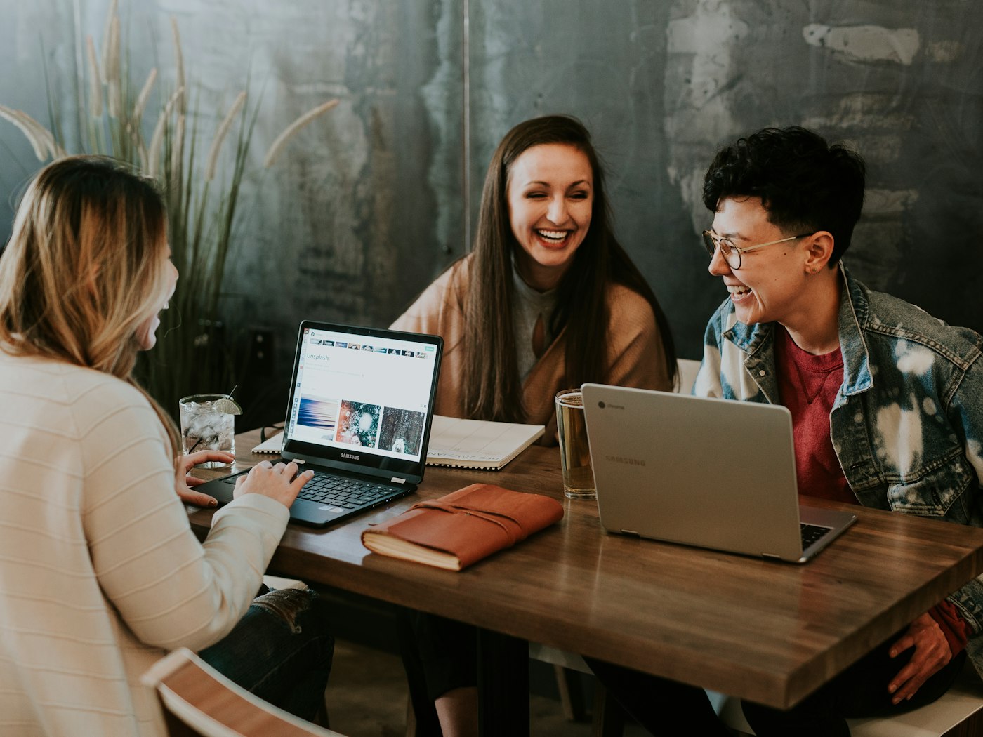 Colleagues discussing payment flows at a shared desk